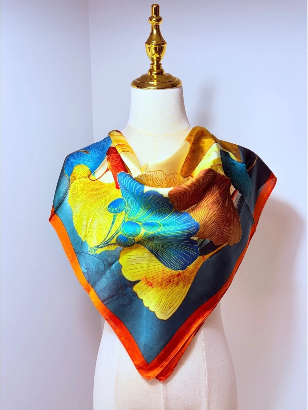 Vibrant Floral Scarf with Orange Border
